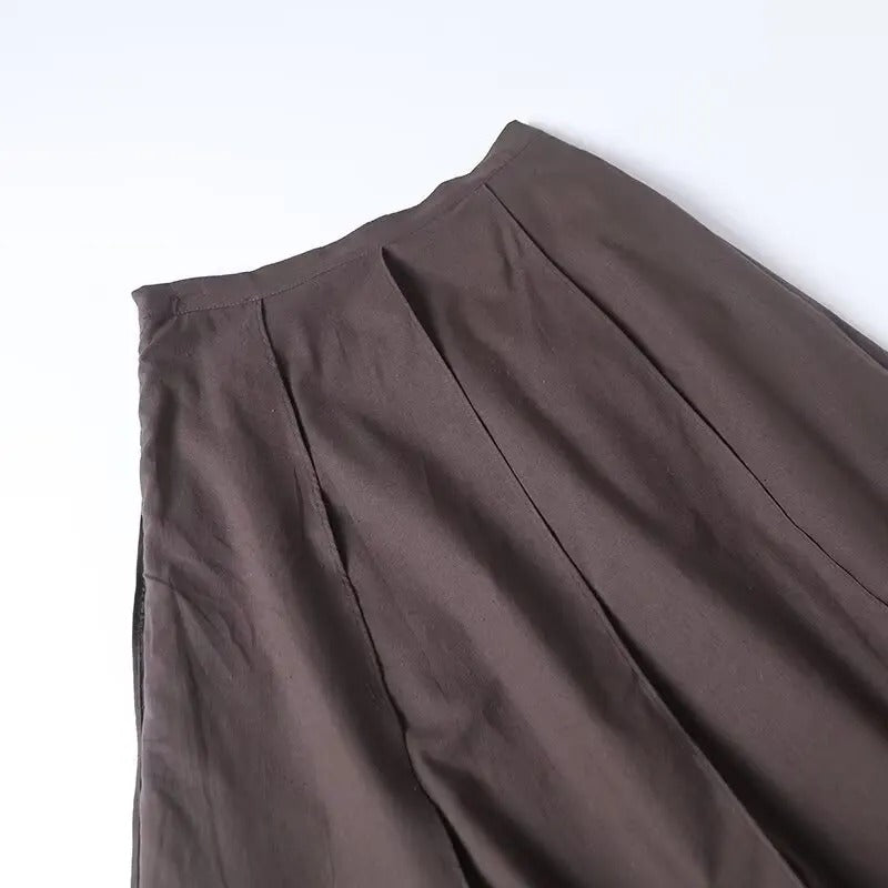 Black pleated midi skirt