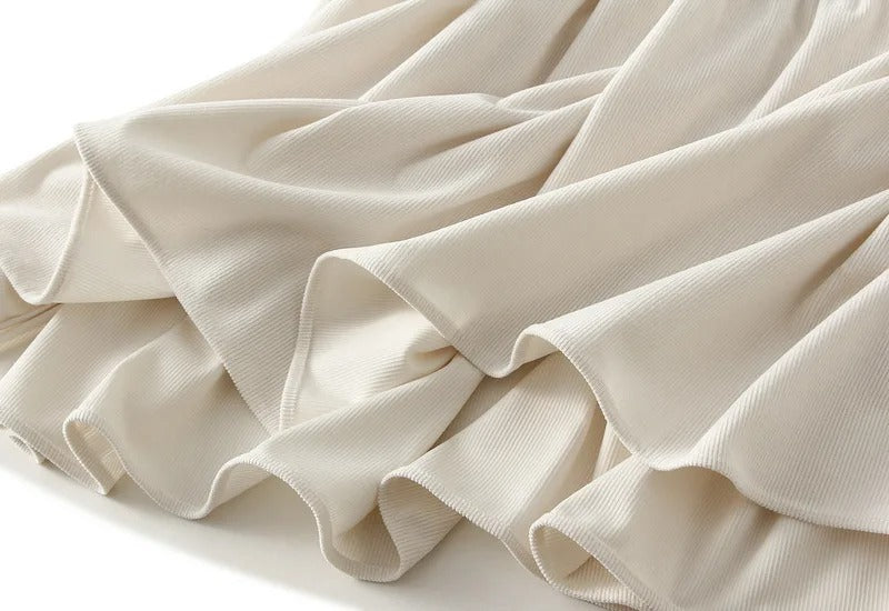 Cream tiered midi skirt with elasticated waistband