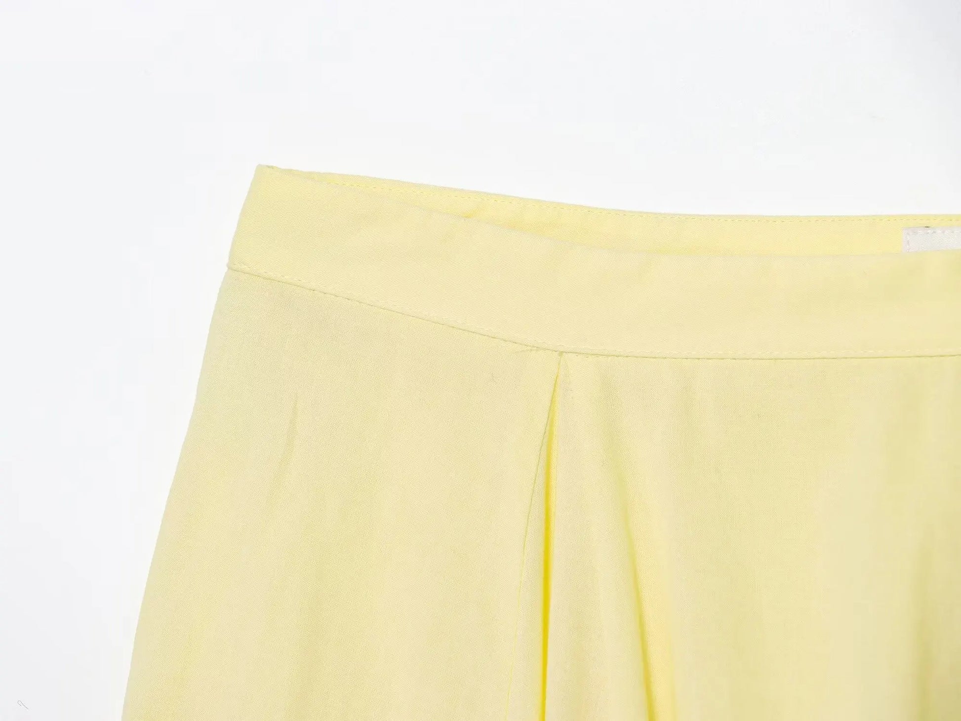 Light yellow pleated midi skirt