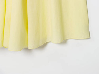 Light yellow pleated midi skirt