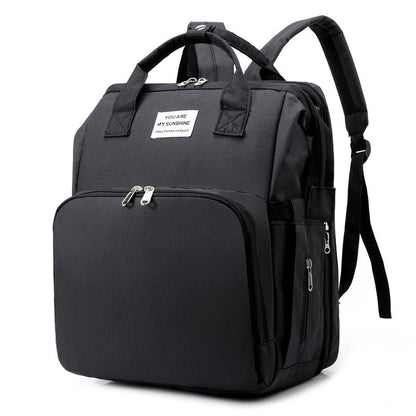 Portable Baby Bed and Nappy Bag – Multi-Function Travel Backpack